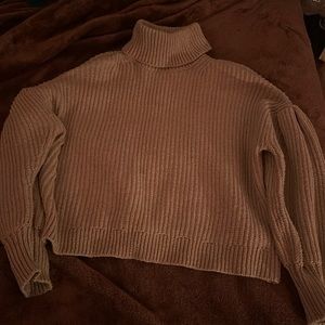 I’m selling this grayish turtleneck sweater in a size XL from Free assembly